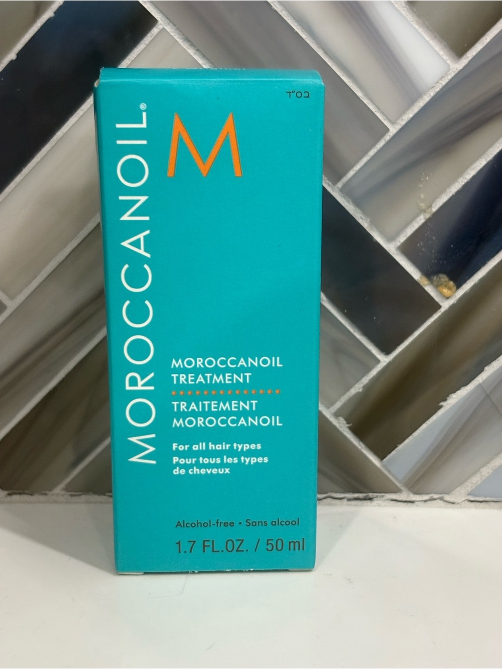 Moroccanoil Treatment 1.7 oz Box in Turquoise with Orange Accent